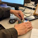 Students in the Computer Science program build a spaceship interface.