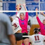 PHOTO BY FOREST WORGUM
Elma middle blockers Emily Escoffon (14) and Nani Kanios attempt to block a spike by Hoquiams Hallie Burgess (3) during a 3-0 loss on Tuesday in Elma.