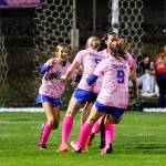 PHOTO BY MIKE ROBERTS Elmas Chelsea Plata (left) celebrates scoring a goal with her teammates during the first half of a 4-1 loss to Montesano on Thursday at Elma High School.