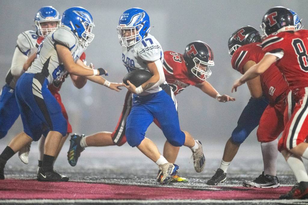 PHOTO BY FOREST WORGUM 
Elma running back Kolby Rademacher (17) carries the ball against Tenino on Oct. 11. The Eagles face Black Hills in a non-league game on Friday.