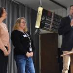 Marchs awardees, Harbors Home Health & Hospice, represented by David Quigg, Angie Brown and Erin Swint (left), update the audience regarding the donation they received.