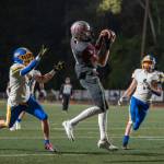 PHOTO BY FOREST WORGUM Montesano receiver Mason Fry (middle) scores on a touchdown catch in the first quarter of a 22-14 win over Rochester on Friday at Jack Rottle Field in Montesano.