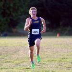 RYAN SPARKS | THE DAILY WORLD Aberdeens Cecil Gumaelius sprints down the home stretch of the boys varsity race at the 2A Evergreen Conference Championships on Wednesday at the Bishop Athletic Complex in Aberdeen.