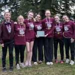 RYAN SPARKS | THE DAILY WORLD The Montesano girls cross country team (from left) Samantha Lubinus, Emily Anderson, Alice Nelson, Sofia Penjakova, Kamille Vandevender, Zoe Ray and Anna OConner won the 1A Evergreen League team title at the 1A Evergreen League Championships on Thursday at the Oaksridge Golf Course.