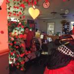 Andrea Watts photos / The Daily World
At the Beehive Retirement Community, families could have their photo taken in front of an Alice in Wonderland backdrop.