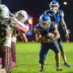 PHOTO BY FOREST WORGUM Elma running back Kolby Rademacher (right) scores the go-ahead touchdown during the fourth quarter of a 13-9 win over Hoquiam on Friday at Elma High School.