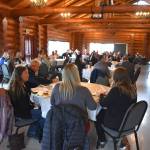 GGHI Business Forum Lunch attendees enjoy lunch ahead of a panel discussion on real estate.