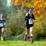ALICIA TISDALE | ALICIATISDALE.COM Aberdeens Ailyn Haggard (right) leads the field on her way to winning her second-consecutive 2A District 4 championship on Thursday at the Lewis River Golf Course in Woodland.