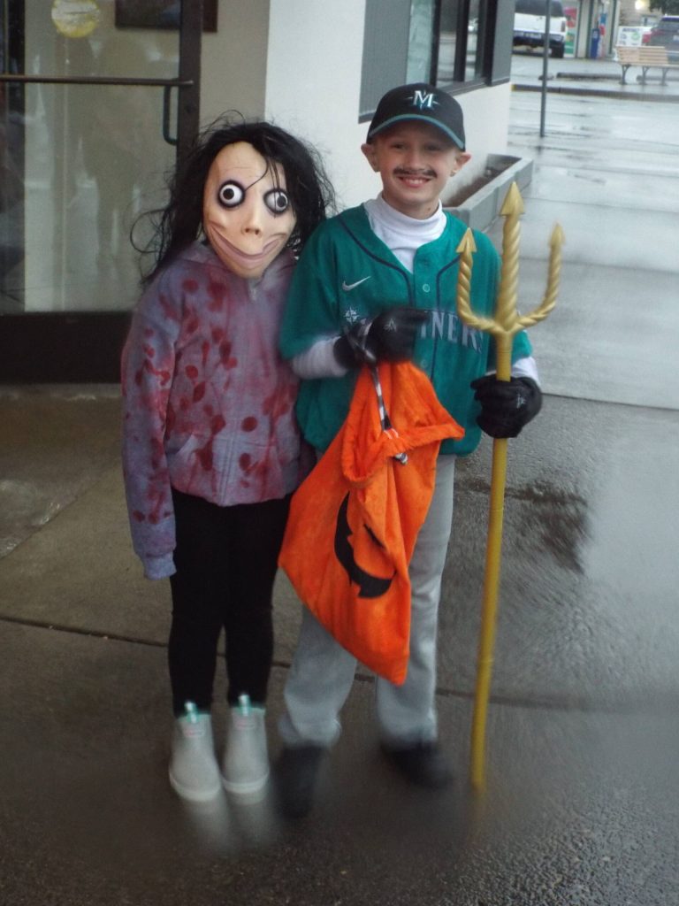 Two trick or treaters stopped by the Elma City Hall for treats during the Halloween Fall Fest in Elma. (Andrea Watts/The Daily World)