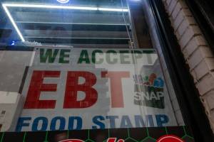Spencer Platt / Getty Images
A store displays a sign accepting Electronic Benefits Transfer, or EBT, cards for Supplemental Nutrition Assistance Program purchases for groceries on Oct. 30 in New York City.