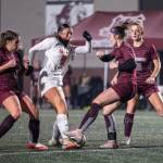 PHOTO BY FOREST WORGUM Montesano defender Emilay Kuntz (right) defends a shot by Cashmeres Gwen Ledesma during Montes 1-0 victory in a 1A State Tournament quarterfinal game on Saturday at Jack Rottle Field in Montesano.