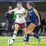 PHOTO BY FOREST WORGUM Montesano midfielder Ashley Hill (3) competes for possession against Cedar Park Christians Christina Tselios during a 5-0 loss in the 1A State Tournament Semifinals on Friday at the Federal Way Memorial Stadium.