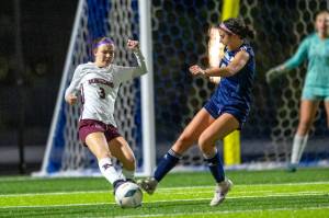 PHOTO BY FOREST WORGUM Montesano midfielder Ashley Hill (3) competes for possession during a 5-0 loss to Cedar Park Christian in the 1A State Tournament Semifinals on Friday at the Federal Way Memorial Stadium.