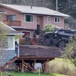 SWAT officers breach a South Bend house where a domestic violence suspect was refusing to surrender.
