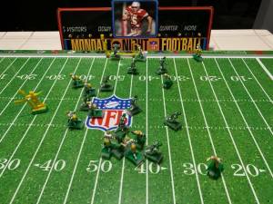 Jerry Knaak / The Daily World
The Eagles and Packers have it out in electric football action.