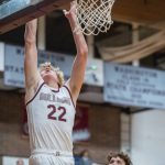 PHOTO BY FOREST WORGUM Montesanos Mason Fry (22) scores during a 69-57 season-opening victory over Centralia on Monday in Montesano.