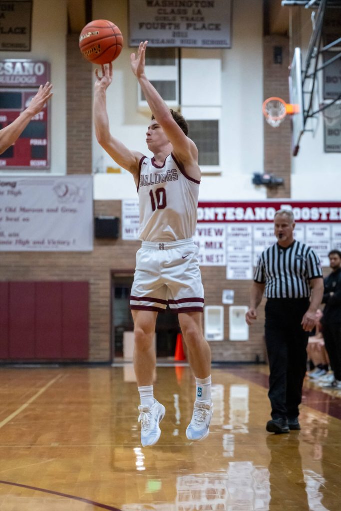 PHOTO BY FOREST WORGUM Montesano guard Terek Gunter shoots a 3-pointer during a 69-57 win over Centralia on Monday in Montesano.