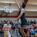 PHOTO BY FOREST WORGUM Montesanos Colton Grubb drives to the basket during a 73-42 win over Raymond-South Bend on Wednesday in South Bend.