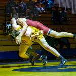 PHOTO BY FOREST WORGUM Aberdeens Andrew Vannoy (yellow) gets Hoquiams Juan Aube off his feet during a 175-pound match at a season-opening dual meet on Thursday at Aberdeen High School.