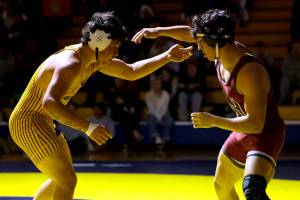 ERICA MCCRORY | MCCRORY PHOTOGRAPHY Hoquiams Kingston Case (right) grapples with Aberdeens Glenny Black during their 165-pound match on Thursday at Sam Benn Gym in Aberdeen.