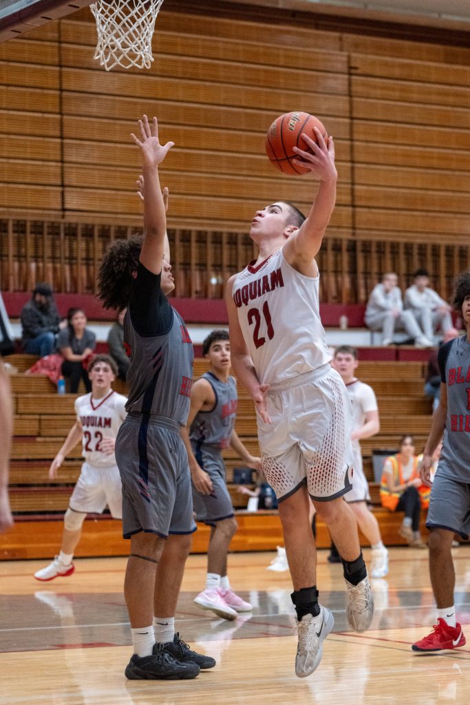 PHOTO BY FOREST WORGUM Hoquiams Talon Abbott (21) shoots the ball during a 56-48 loss to Black Hills on Friday at Hoquiam High School.