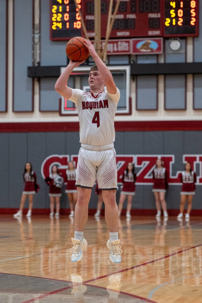 PHOTO BY FOREST WORGUM Hoquiam senior Joey Bozich shoots a 3-pointer during a 56-48 loss to Black Hills on Friday at Hoquiam High School.