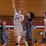 PHOTO BY FOREST WORGUM Hoquiam guard Lincoln Niemi (24) scores on a layup during a 56-48 loss to Black Hills on Friday at Hoquiam High School.