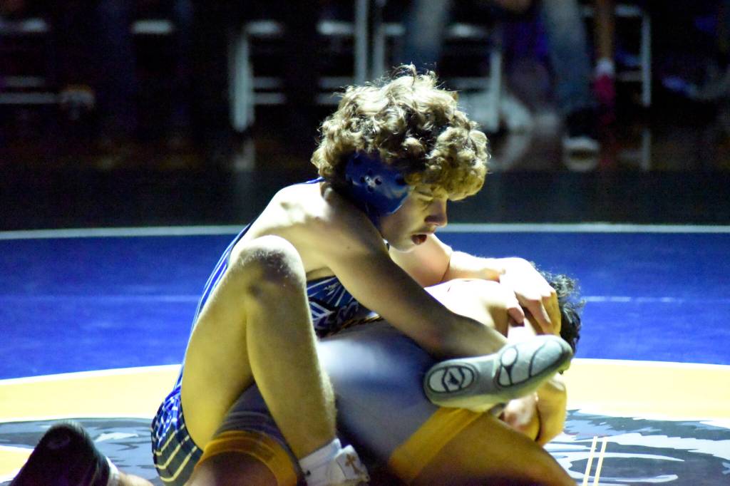 PHOTO BY SUE MICHALAK BUDSBERG Elmas Aidyn Johnson (left) earned a victory in a dual meet against Wapato on Friday at Wapato High School.