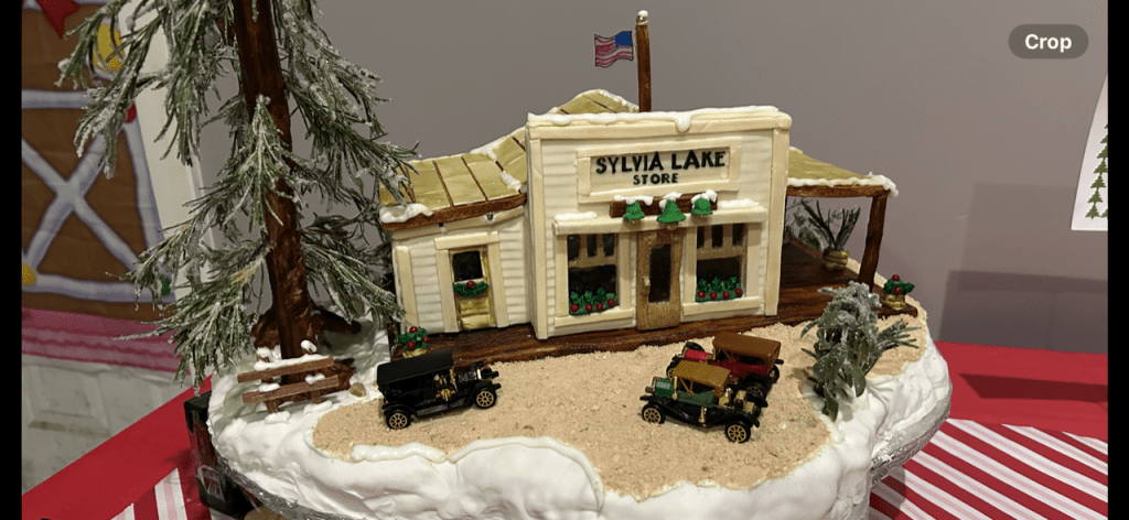 Trina Youngs First Place winner in the Adult Division for the Gingerbread House Competition at WinterFest 2025 is a rendition of the original Sylvia Lake Store from the 1920s.