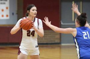RYAN SPARKS | THE DAILY WORLD Montesanos Jillie Dalan (24) surveys the floor during a 66-37 loss to Toutle Lake on Monday at Montesano High School.