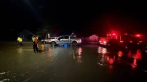 Jeff Clemens / Chinook Observer
Officers helped South Bend residents to safety Monday night as flooding endangered low-lying areas along the Willapa River.