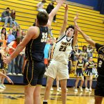 RYAN SPARKS | THE DAILY WORLD Aberdeens Jhacob Quezada (23) shoots over Forks Radly Bennett during the Bobcats 62-34 victory on Wednesday at Sam Benn Gymnasium in Aberdeen.
