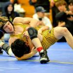 ERICA MCCRORY | MCCRORY PHOTOGRAPHY Aberdeens Sebastian Street (top) works to gain a pinfall win over Fifes Kodi Vincecruz in the 113-pound final at the Larry Brown Invitation on Saturday at Fife High School.