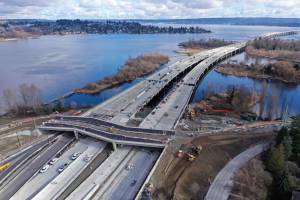 Washington State Department of Transportation
An aerial view in February 2024 of work on a new bike and pedestrian bridge over State Route 520 and connecting trails north and south of the highway.