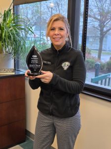 Grays Harbor County
Grays Harbor District 1 Commissioner Georgia Miller posed for a photo with her Statesman of the Year Award bestowed upon her by the Olympia Master Builders.
