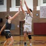 PHOTO BY FOREST WORGUM Montesano guard Colton Grubb (1) hits a game-tying 3-pointer in the fourth quarter of a 54-48 overtime win against W.F. West on Thursday at Montesano High School.