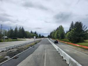 WSDOT photos
On the morning of May 1, crews moved one lane of U.S. Highway 12 onto the new westbound bridge over Camp Creek near Montesano. This was the first of six new bridges completed between Montesano and Elma. Once crews reconfigured the temporary median lane, both directions of travel shifted onto the new bridge for about a year.
