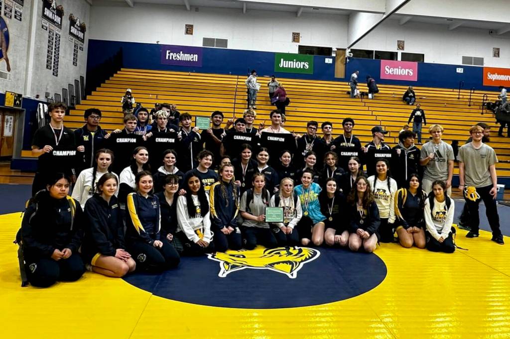 ERICA MCCRORY | MCCRORY PHOTOGRAPHY Aberdeens boys and girls wrestling teams pose for a photo after each won their respective team title at the Grays Harbor Championships on Saturday in Aberdeen.