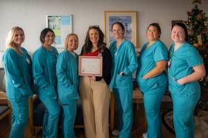Photo courtesy of Harbor Regional Health
The Harbor Regional Health Family Birth Center team poses for a photo with its Center of Excellence for Perinatal Substance Use award.