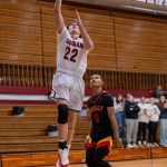 PHOTO BY FOREST WORGUM Hoquiam freshman K.J. McCoy (22) glides in for two of his 16 points during a 69-52 win over Steliacoom on Saturday at Hoquiam High School.