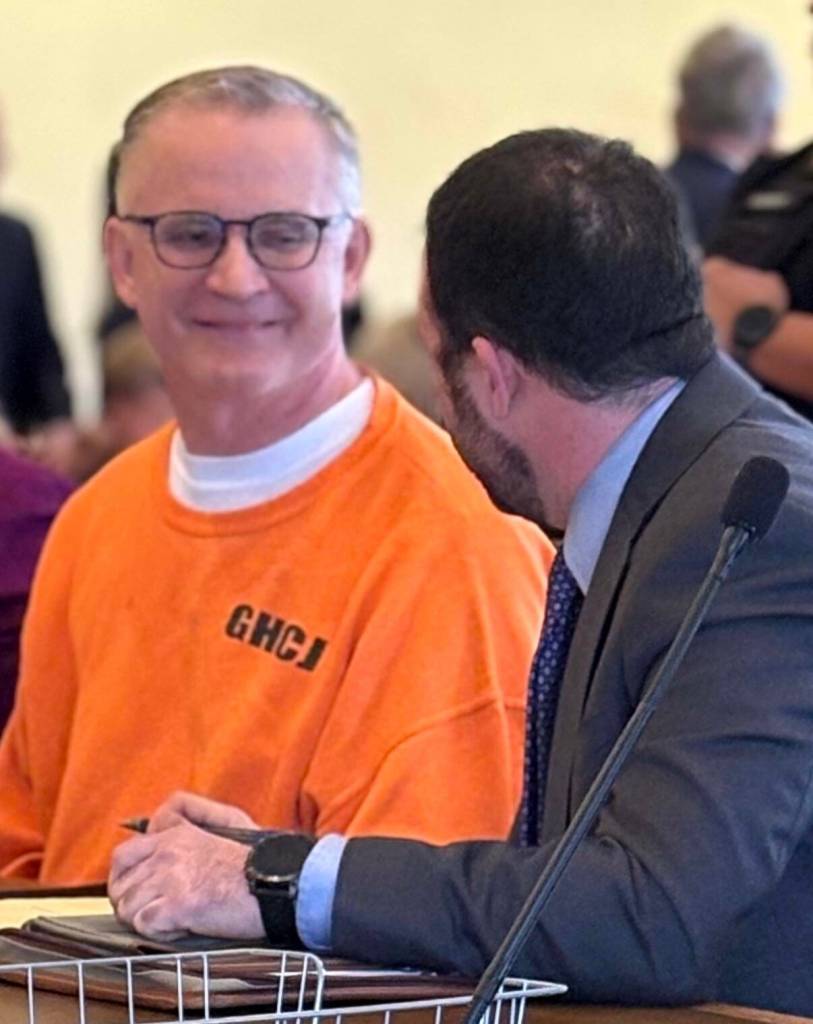 The Daily World
Former Ocosta teacher Wade Eric Iseminger chats with one of his defense attorneys, Luke Laughlin.