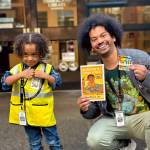 Timberland Regional Libraries
Mychal Threets poses for a photo with Workman MJ at the Lacey Timberland Library.
