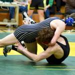 PHOTO BY SUE MICHALAK BUDSBERG Elmas Ben Totten (top) controls Mount Bakers Cole Christensen during the 144-pound final of The Rock Tournament on Tuesday at Vashon Island High School.