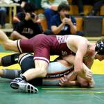 PHOTO BY SUE MICHALAK BUDSBERG Montesanos Finley Ekerson (top) works to earn a pin against Zillahs Quintino Hernandez in the 120-pound title match of The Rock Tournament on Tuesday at Vashon Island High School.