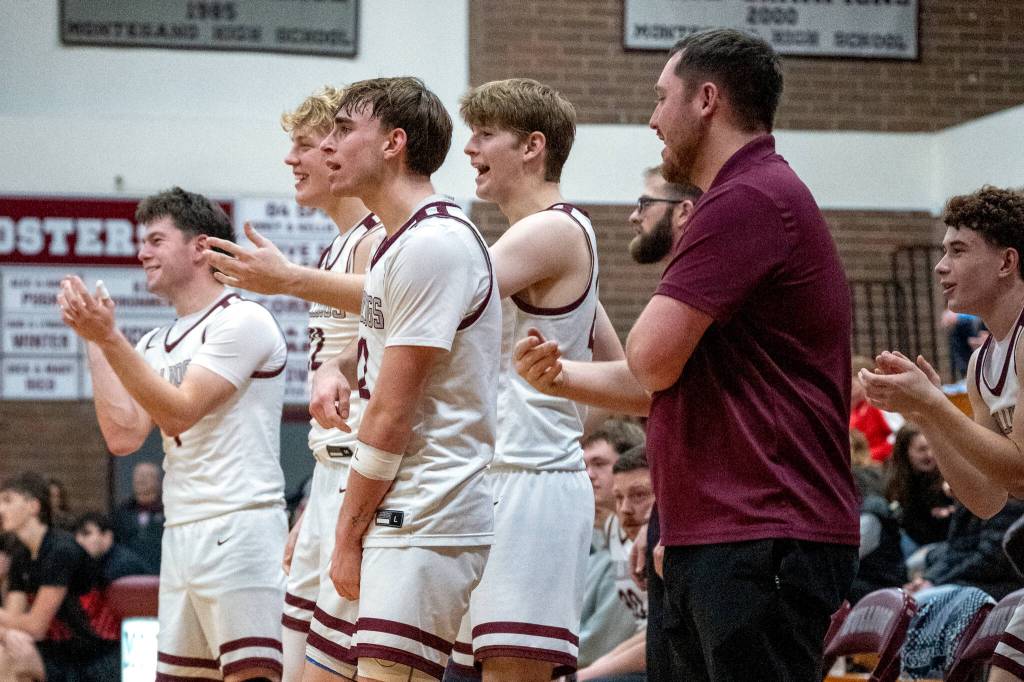 PHOTO BY FOREST WORGUM The Montesano bench celebrates a play during a 74-21 win over Tenino in a 1A Evergreen League game on Tuesday in Montesano.