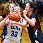 PHOTO BY MIKE ROBERTS Elmas Olivia Moore (33) scored a game-high 29 points in a 61-42 win over Tenino in a 1A Evergreen League game on Friday at Elma High School.