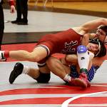 ERICA MCCRORY | MCCRORY PHOTOGRAPHY Hoquiams Kingston Case (left) wrestles against Elmas Jackson Bucy during in a 157-pound match at the Ron Baze Memorial Invitational on Saturday at Hoquiam High School. Case would advance to win the weight class.