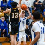 PHOTO BY MIKE ROBERTS Elmas Trey Yeager (5) shoots against North Beachs Jayden Apodaca (12) during the Eagles 66-24 victory on Monday at Elma High School.