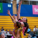 PHOTO BY FOREST WORGUM Hoquiams Sydney Gordon (top) shoots over Aberdeens Sophie Knutson during the Grizzlies 61-35 win on Monday in Aberdeen.
