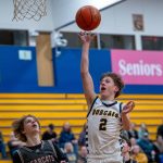 PHOTO BY FOREST WORGUM Aberdeens Ryker Scott (2) shoots against W.F. Wests Gage Grishman during the Bobcats 62-51 victory on Tuesday at Aberdeen High School.